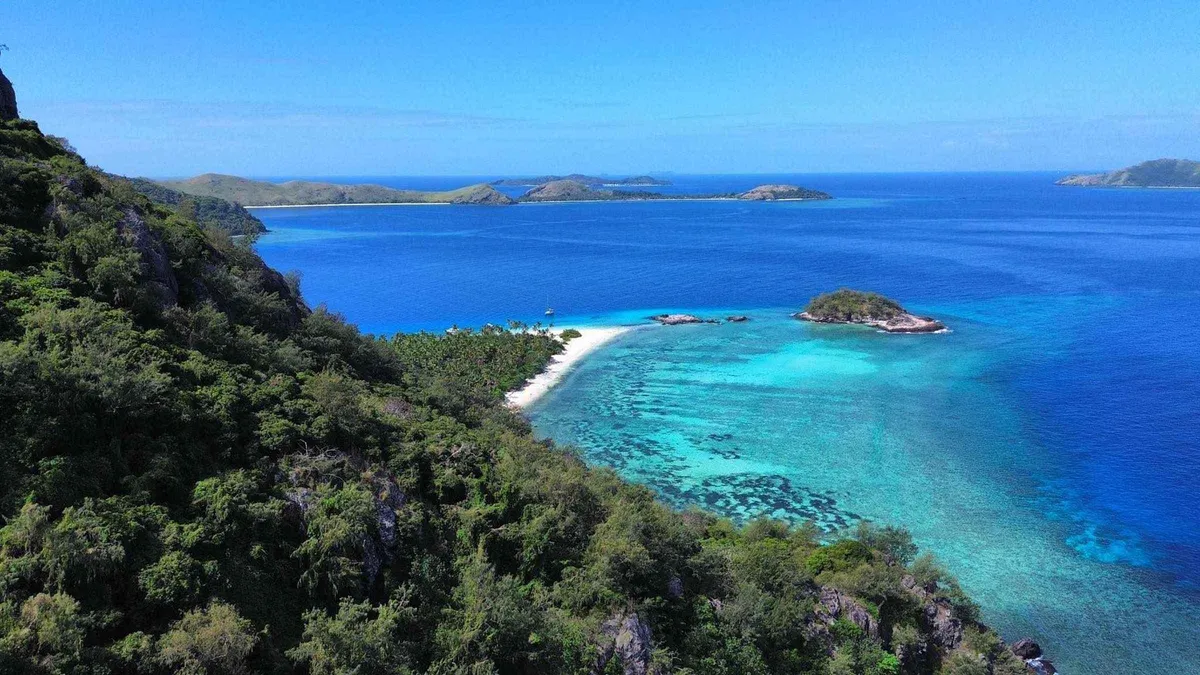 Turquoise lagoon and coral reef in the inner Mamanuca Islands, where the half-day snorkel and turtle sanctuary trip runs